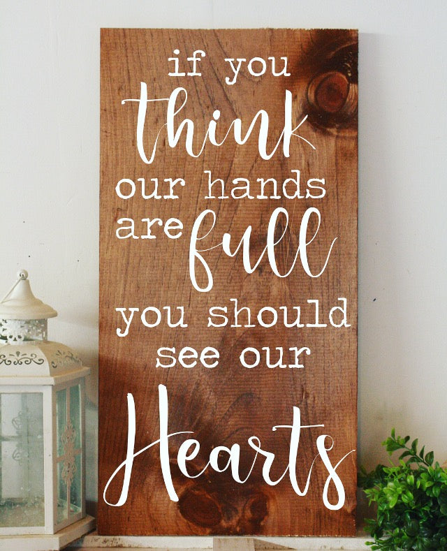 If you think our hands are full, you should see our hearts sign
