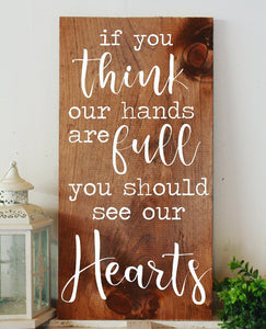 If you think our hands are full, you should see our hearts sign